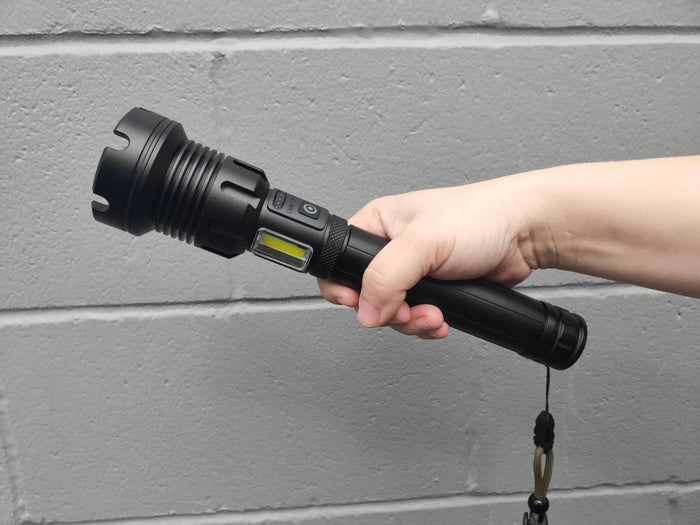 Rechargeable LED torch by dealonline.co.nz with high lumens and two 26650 batteries, compact flashlight for outdoor use