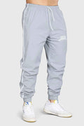 Light grey Fuaark Nz Lifting Community Joggers, comfortable fit, casual style, shown on a model.
