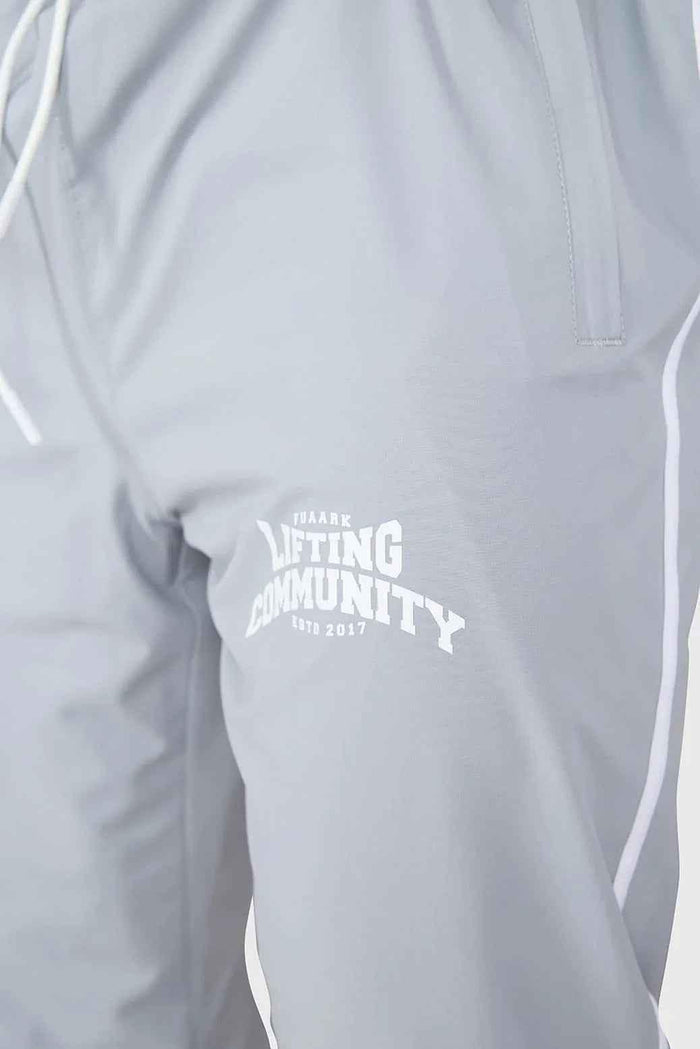 Light grey Fuaark Nz Lifting Community Joggers, casual athletic pants with a relaxed fit and drawstring waist.
