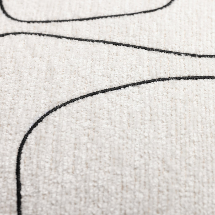 Close-up of textured fabric with black embroidered lines