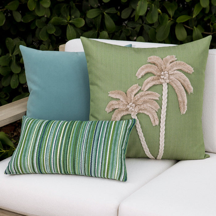 Luxury ouutdoor safe velvet accent cushions on a rooftop seating area, featuring soft touch performance weave for residential and commercial interiors