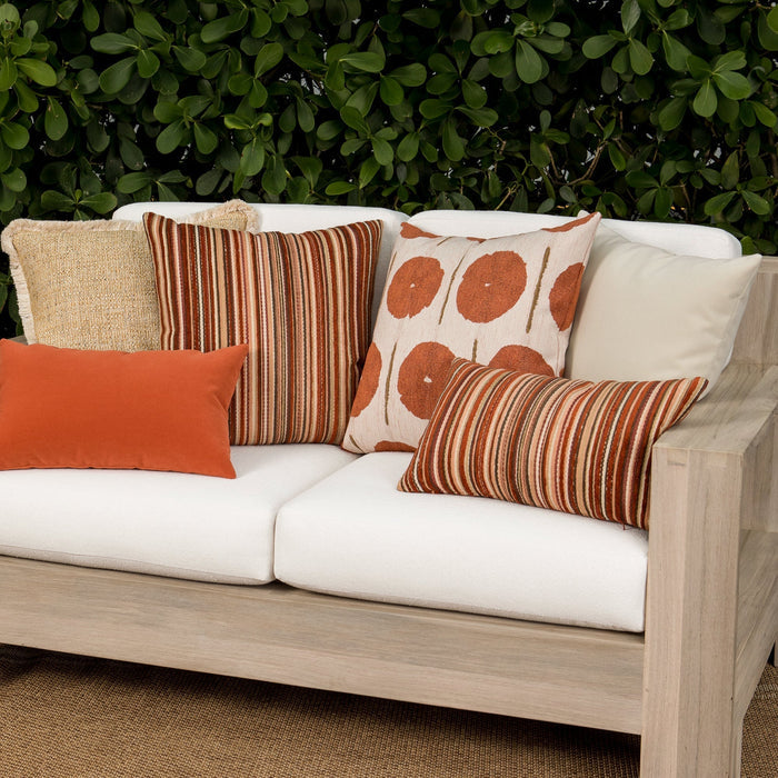 Luxury gold textured woven cushions on a outdoor sofa, featuring all weather performance construction for residential and commercial interiors