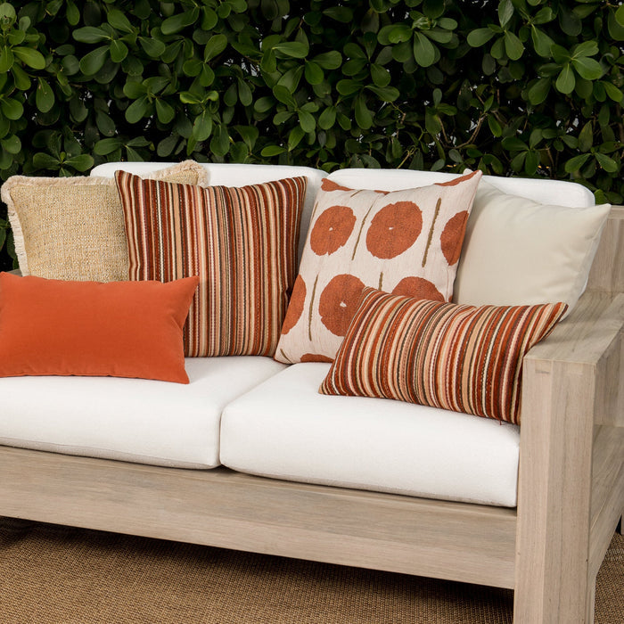 Luxury gold textured woven cushions on a outdoor sofa, featuring all weather performance construction for residential and commercial interiors