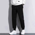 Men's Shadow-Stride Athletic Pants by Stylish 3Sixty5, dark color, slim fit design, athletic style, made for active wear.