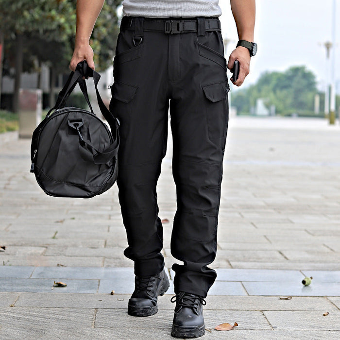 Men's tactical cargo pants in water-resistant flex ripstop fabric, featuring multiple pockets and durable construction.