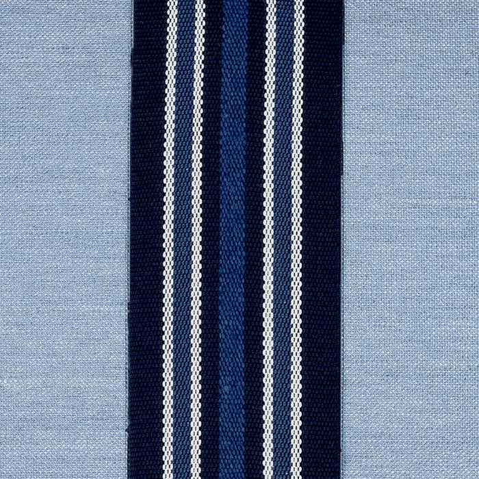 Detail image of Blue solid pillow with center band in lumbar size for coastal indoor and outdoor decor