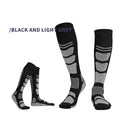 Dark grey and black over-the-knee wool hiking socks by Mead's Supply & Equipment for outdoor adventures and trail walking.