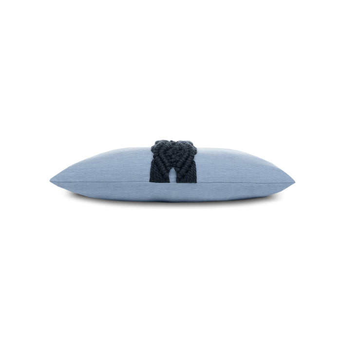 Side image of Blue pillow with dark blue macrame detailing as center band, lumbar size for bold indoor and outdoor decor