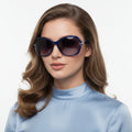 Blue polarized sunglasses with rhinestone deco by Dealonlinenz, featuring stylish frames and vibrant lens details.