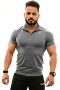 Grey Polo T-shirt from Fuaark Nz, casual short-sleeve shirt with a classic collar and subtle branding, displayed flat.