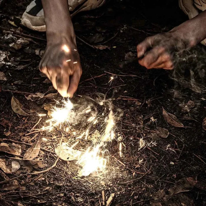 Portable outdoor flint fire starter by Mead's Supply & Equipment Outfitters, cylindrical camping equipment for reliable fire lighting.
