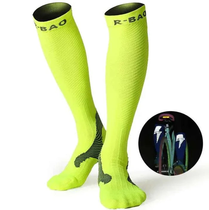 Blue professional long compression socks for running and cycling, made of 72% nylon, from Mead's Supply & Equipment Outfitters.