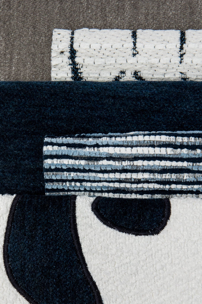 Coordinating fabrics to Linear indigo outdoor-safe fabric with a soft gradient stripe pattern