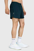 Deep green Pulse 4-inch running shorts by Fuaark NZ, lightweight athletic shorts with a comfortable fit for running.