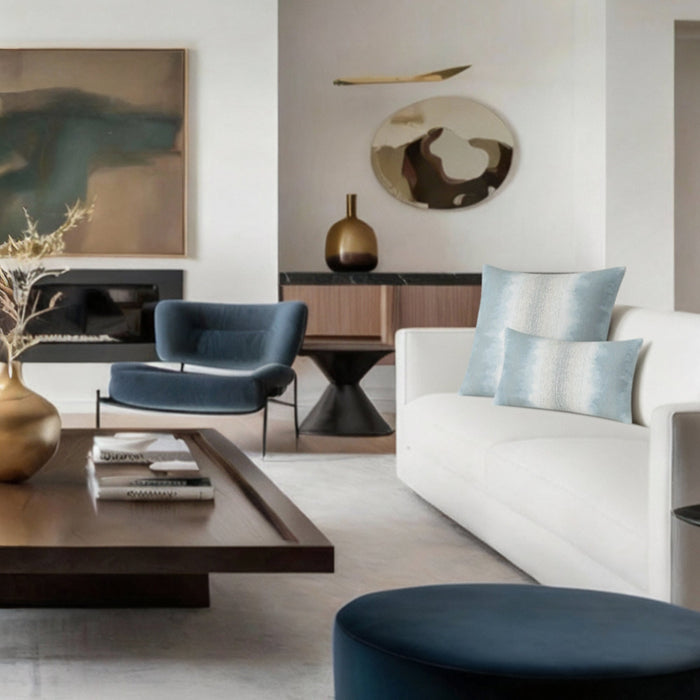 light blue ombre striped pillows on modern sofa