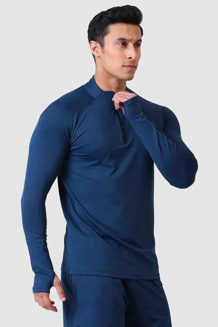 Fuaark Nz teal Rush Pullover T-shirt displayed on a hanger, showcasing soft fabric and casual style.