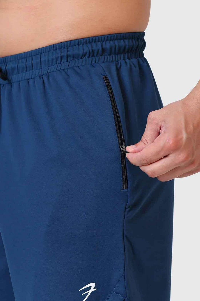 Fuaark Nz Rush Shorts in teal, casual men's shorts with a relaxed fit, displayed on a neutral background.