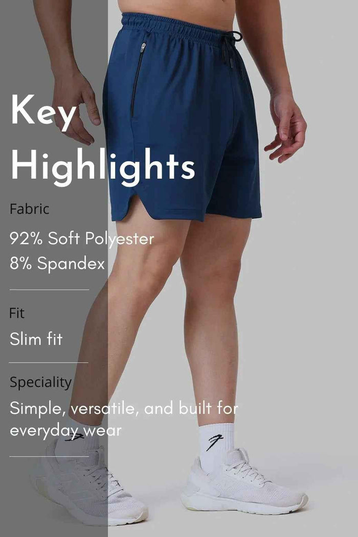 Fuaark Nz teal Rush Shorts laid flat, showcasing casual shorts with a relaxed fit and sporty design.