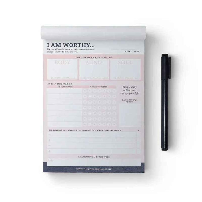 Self-care habit tracker notepad by Awesome Inc NZ with "I Am Worthy" message, designed for tracking daily self-care routines.