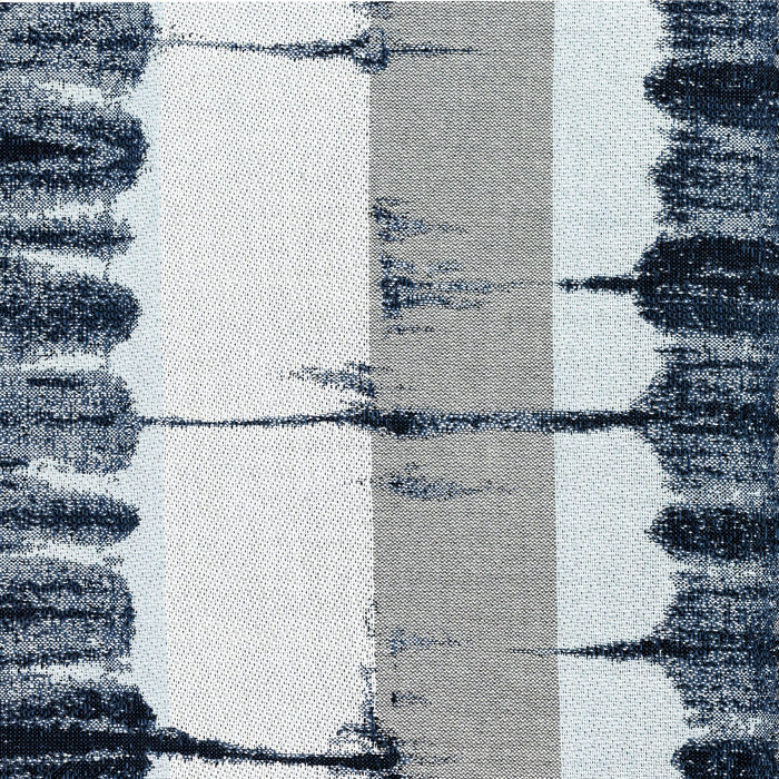 Detail image of Artistic outdoor-safe fabric featuring a hand-dyed Shibori indigo pattern