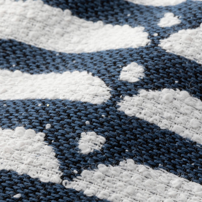 Close-up of blue and white striped fabric texture