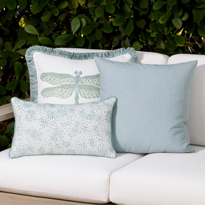 Outdoor image of pillows in Light blue outdoor safe woven fabric with solid pastel tones