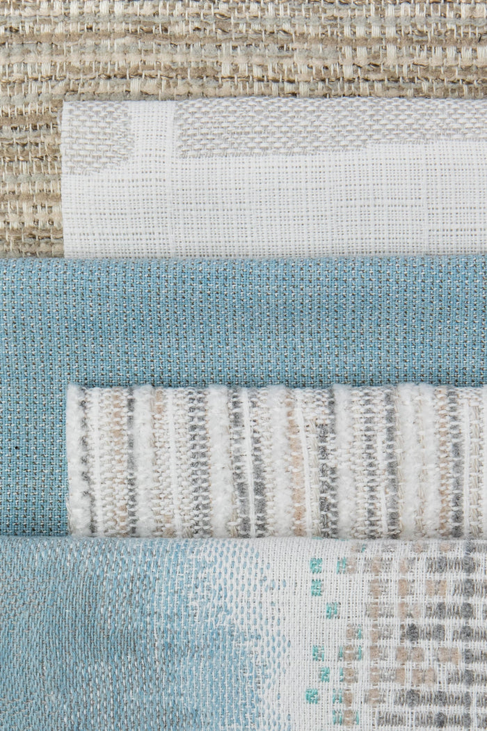 Coordinating fabrics to Light blue outdoor safe woven fabric with solid pastel tones