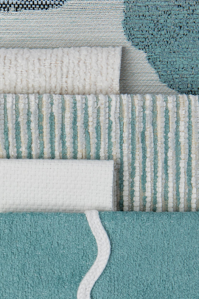 Coordinating fabrics to Outdoor safe fabric with circular watercolor motif in mist blue tones