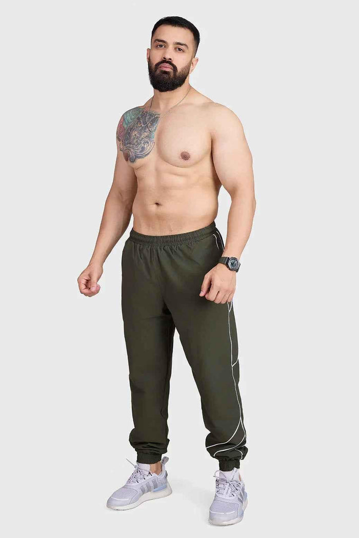 Fuaark Nz sprint joggers in army green, lightweight track pants with elastic cuffs and drawstring waist for athletic comfort.