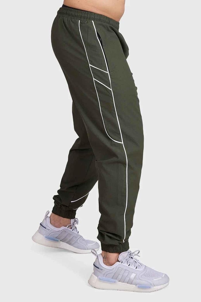 Fuaark Nz Sprint Joggers Army green track pants with elastic waistband and tapered fit, designed for active wear and comfort.