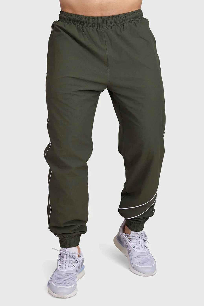 Fuaark Nz Sprint Joggers Army track pants in green, featuring an athletic fit and drawstring waist for active wear.