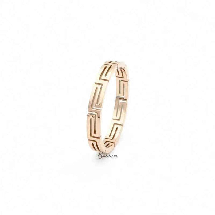 Rose gold stainless steel Greek key ring from Glitters, featuring a sleek, modern design with intricate geometric pattern.