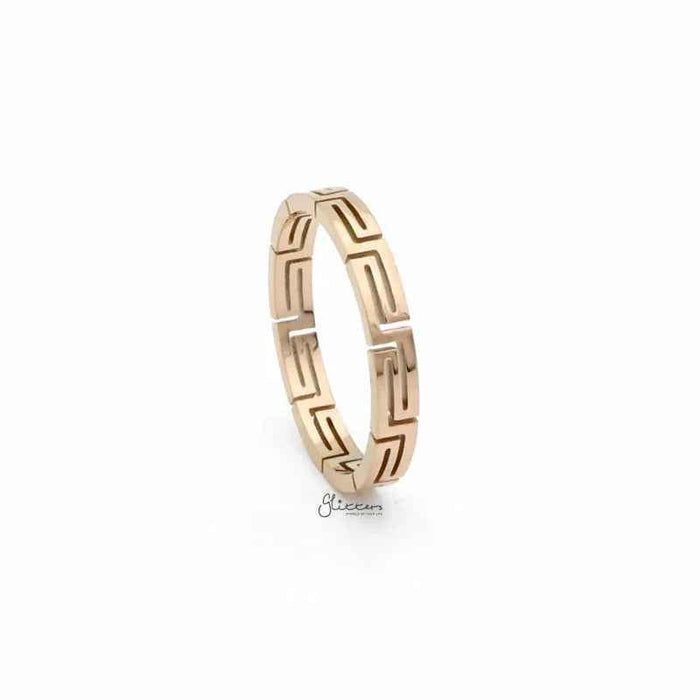 Rose gold stainless steel Greek key ring from Glitters, featuring intricate geometric design and polished finish.