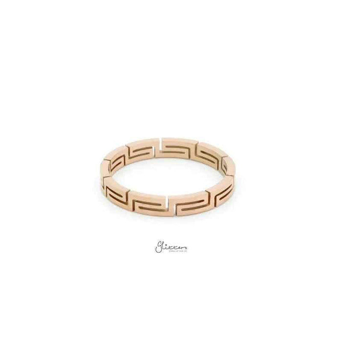 Rose gold stainless steel Greek key ring by Glitters, featuring a detailed geometric pattern on a sleek, polished band.