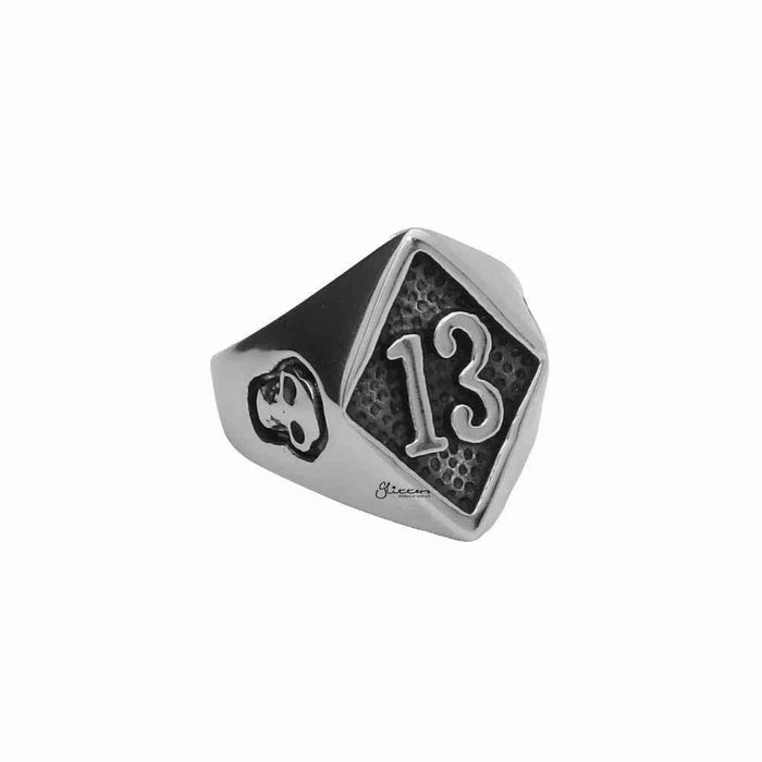 Stainless steel Number 13 and skulls ring by Glitters featuring engraved number 13 and skull designs on a sleek band.
