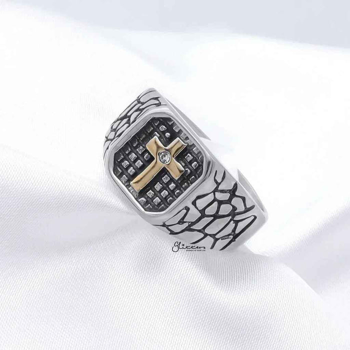 Stainless steel two-tone cross ring by Glitters, featuring a polished cross design on a sleek stainless steel band.