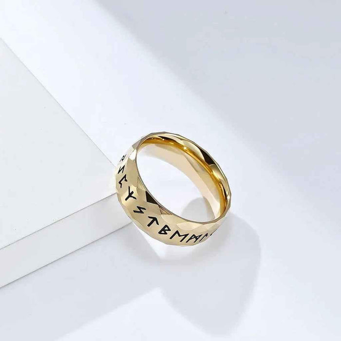 Gold stainless steel Viking Norse rune ring by Glitters featuring intricate Norse symbols and detailed craftsmanship.