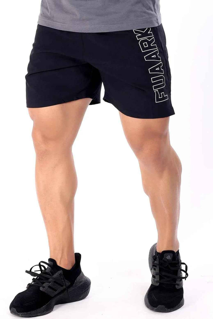 Black Fuaark Nz Studio Shorts shown on a model, featuring a comfortable fit and casual style.