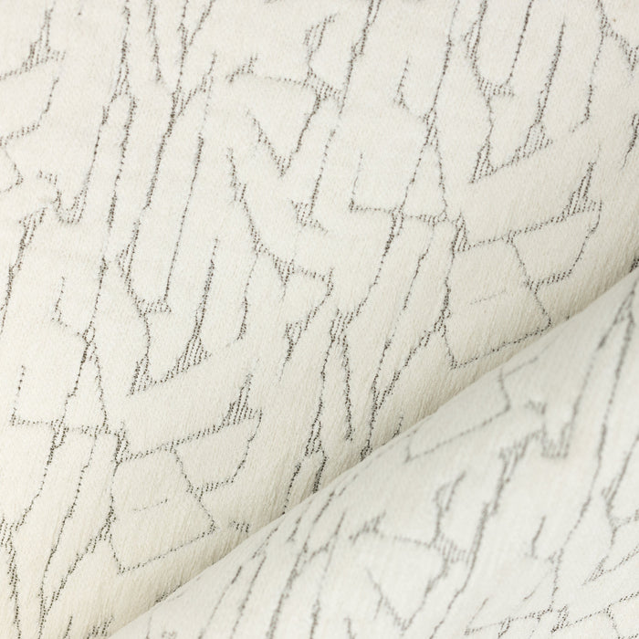 Close shot texture image of Ivory chenille outdoor-safe woven fabric with delicate broken line design
