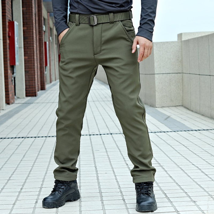 Water-resistant tactical soft shell cargo pants with fleece lining, windbreaker style, available in sizes 32-42.