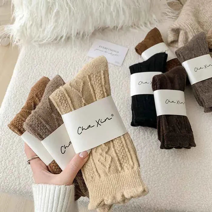 Thick diamond-shaped wool mid-thigh socks for women, warm cozy fall and winter leg warmers from Mead's Supply & Equipment Outfitters.