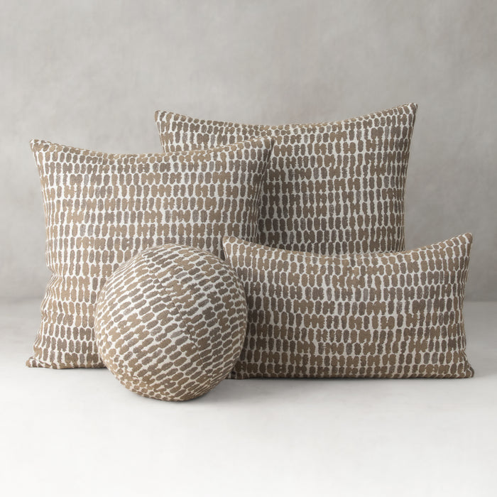 Set of patterned cushions on a neutral background