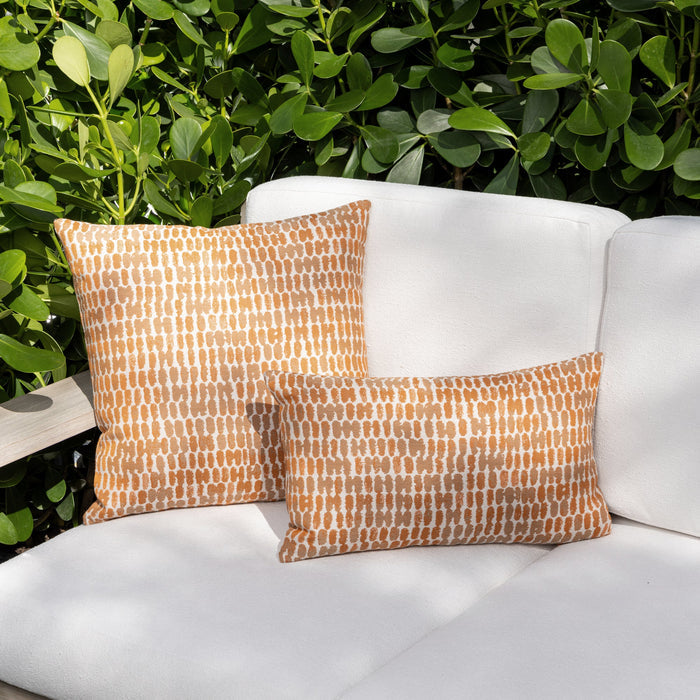 Outdoor image of pillows in Thumbprint Tuscan – outdoor-safe woven fabric by Elaine Smith, ideal for high-end commercial and residential applications.