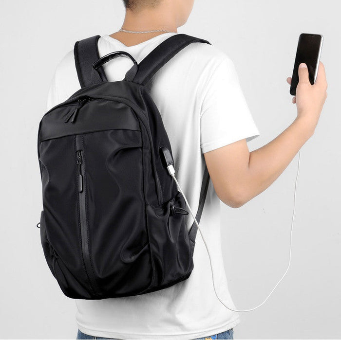 Travel backpack computer bag by dealonline.co.nz with USB charging port, water-resistant material, and multiple compartments.