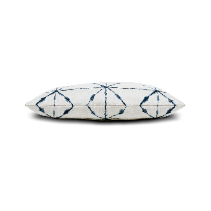 Side image of Ivory and indigo lattice pillow in lumbar size for stylish indoor and outdoor decor by Elaine Smith