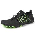 Unisex outdoor water shoes in black and green by Mead's Supply & Equipment Outfitters, designed for quick-dry hiking and swimming.