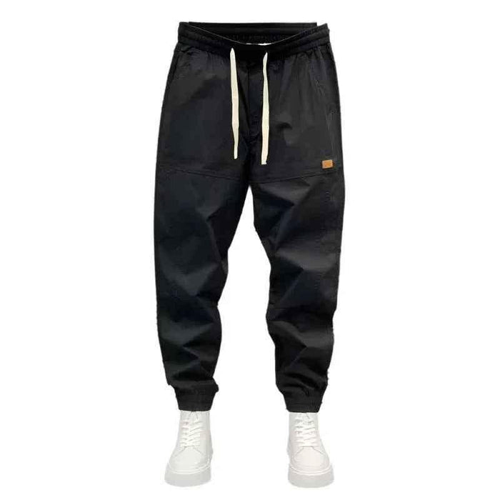 Black Stylish 3Sixty5 urban seasonal jogger trousers, made of comfortable fabric with a relaxed fit and elastic waistband.