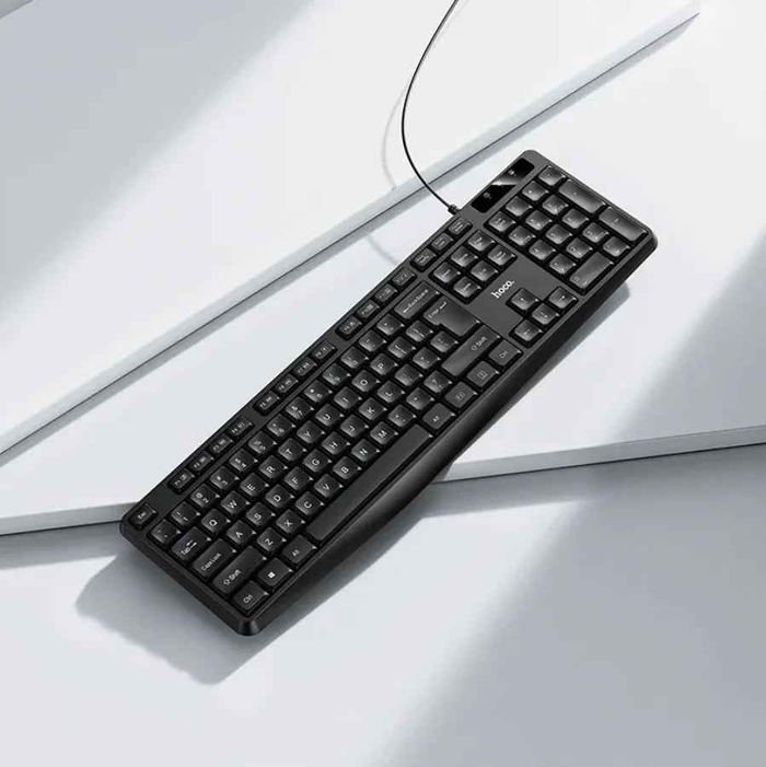 Techplus USB wired full-size keyboard with black keys and standard layout, featuring a numeric keypad and multimedia keys.
