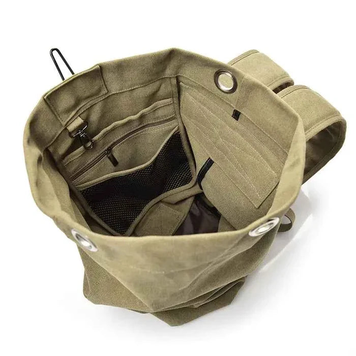 Waterproof canvas hiking backpack by Mead's Supply & Equipment, high-capacity outdoor travel rucksack in two sizes with adjustable straps.