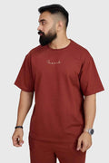 Rust-colored oversized T-shirt from Fuaark NZ, designed for ultimate comfort, featuring a relaxed fit and casual style.